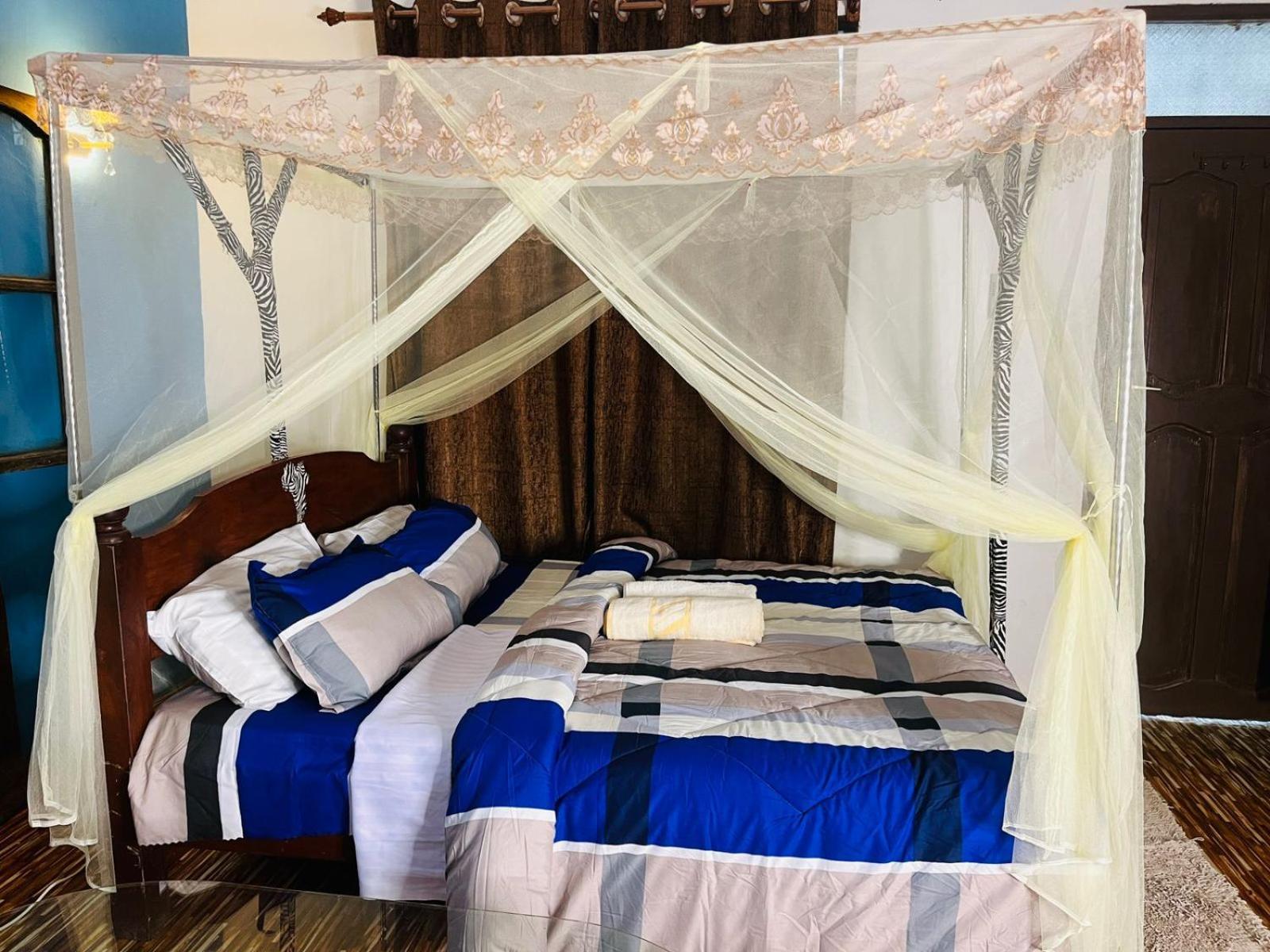 Akogo House - Bnb , Hostel, Backpackers & Volunteer Center Момбаса Экстерьер фото